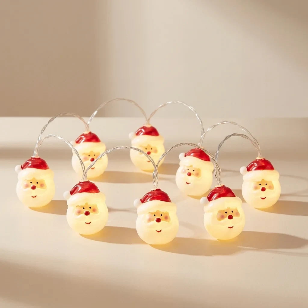 Christmas String Lights with 20 LED Santa Heads Battery Operated 3 Meter Warm White - Image 1