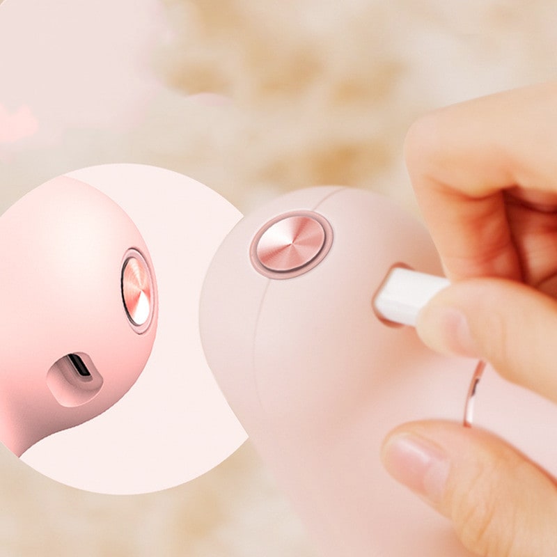Girls' Mini Handheld Deep Tissue Massage Gun with Four Interchangeable Heads and Portable Cordless Design - Image 5