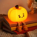 Halloween Pumpkin Night Light LED Rechargeable with Dangling Legs and Sad Face Design - Image 1