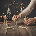 Halloween Skeleton Decorations Mini Plastic Poseable Figures for Party and Haunted House - Image 1
