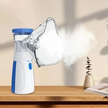 Kids' Portable Nebulizer for Asthma and Respiratory Care with Handheld Mesh Machine and Face Mask - Image 1