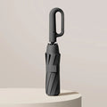 Repel Windproof Travel Umbrella with UV Blocker Compact Folding Design and Carabiner Clip - Image 1
