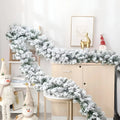 Snow-Flocked Artificial Christmas Garland for Stairs and Fireplace - Image 1