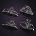 Women's Halloween Hair Claw Clips with Skeleton Hand Bat Wing and Spiderweb Metal Decorative Design - Image 1