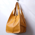 Women's Leather Tote Bag with Large Front Pocket and Slouchy Unstructured Silhouette for Work - Image 1